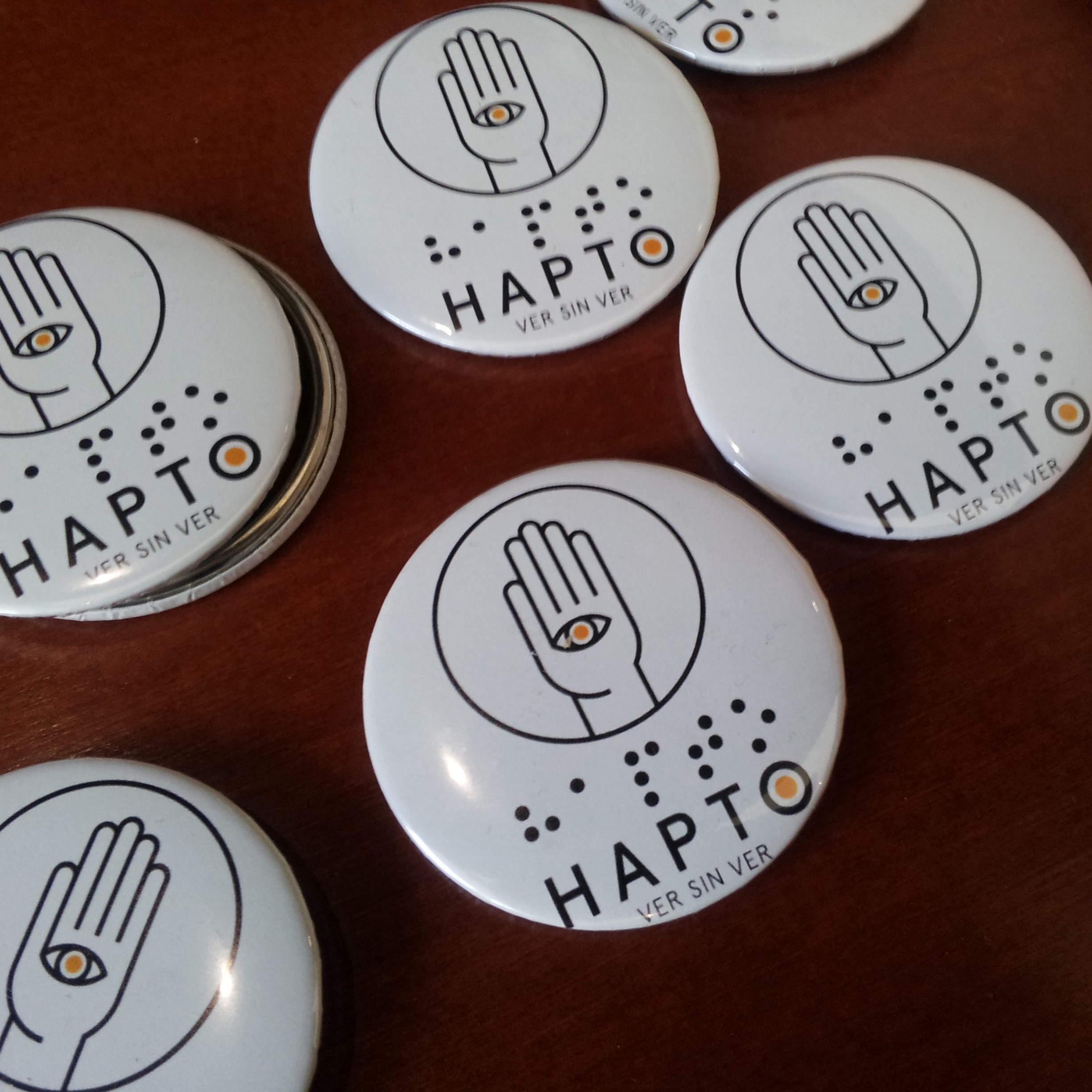 Logo de HAPTO.
